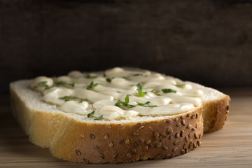 Sandwich with cream cheese and parsley