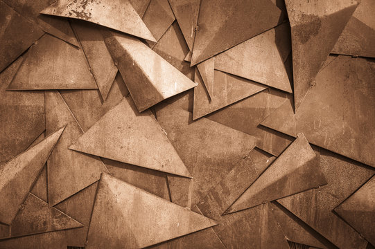 rusty metal background - pattern with metallic triangles