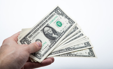 hand holds a dollar bill