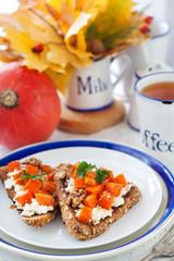 Rye toast with cottage cheese and pumpkin