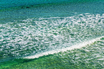 Fototapeta na wymiar closeup emerald sea vawes