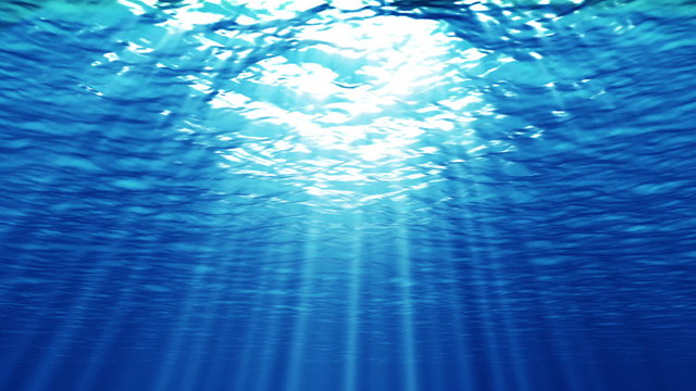 Underwater scene with sunlight rays through water