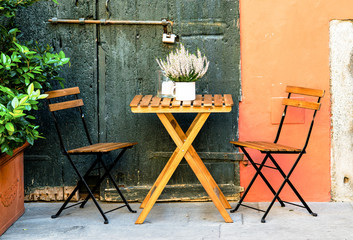 table for two in a courtyard