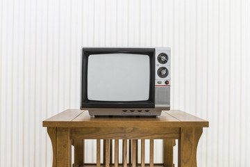 Old Portable Television on Wood Table