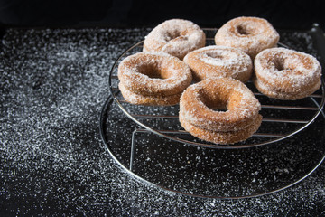 Homemade fried donuts with sugar