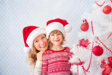 Family near Xmas tree