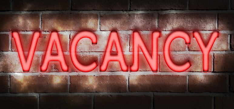 Illustration showing a neon "vacancy" sign on a brick wll