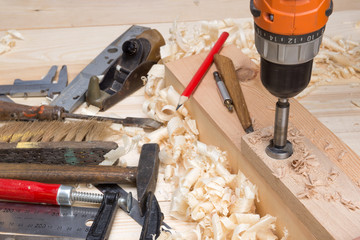 carpentry tools and wood shavings in the workshop