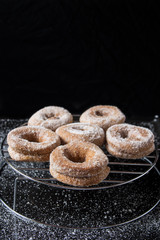 Homemade fried donuts with sugar