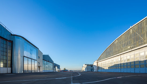 Fototapeta The area between aircraft hangars