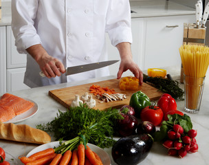 Chef preparing different dishes