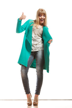 Woman Green Coat Making Thumb Up Sign