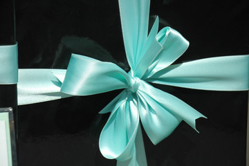 Gift box with blue ribbon