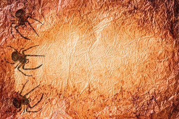 Parchment Paper Background with Spider Silhouettes 