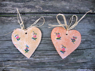 Hearts on wooden background
