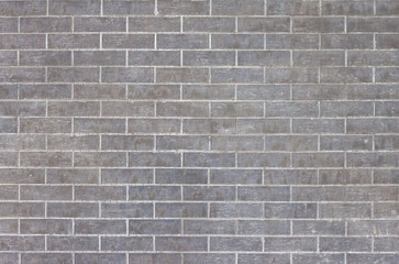 Fototapeta premium External grey brick wall background