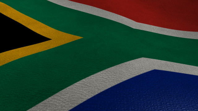 A closeup of a south African flag waving in the wind