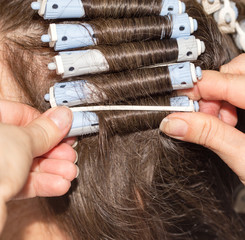 Permanent hair in a beauty salon