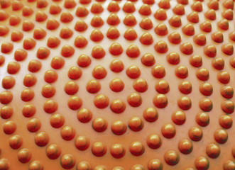 Orange textures/abstract background texture of plastic board.