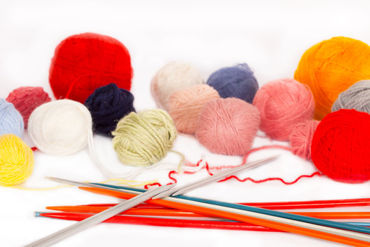 Vintage Knitting needles, wool balls and yarn 