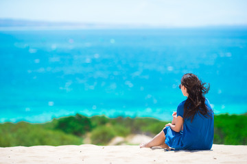 Young woman enjoy tropical beach vacation