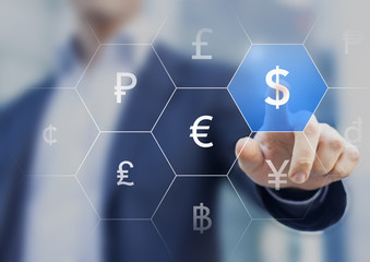 Businessman presenting currencies on virtual screen and touching