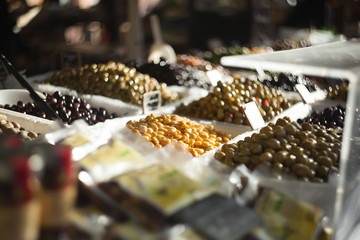 Street market in Nice, France. Olives selective focus.