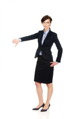 Business woman showing thumbs down.