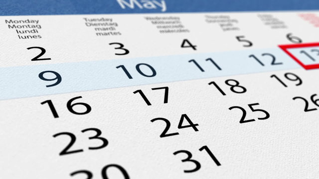Date pointer moves over clean calendar with blue header, close-up