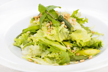 vegetable salad with asparagus on a table in a restaurant