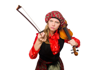 Funny woman in scottish clothing with violin