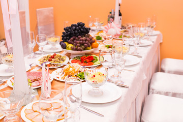 Christmas And New Year Holiday Table Setting. Celebration. Place setting for Christmas Dinner. Holiday Decorations. Decor