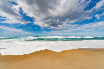 Wave of the sea on the sand beach