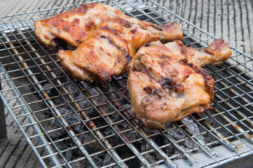 Roasted chicken on grill