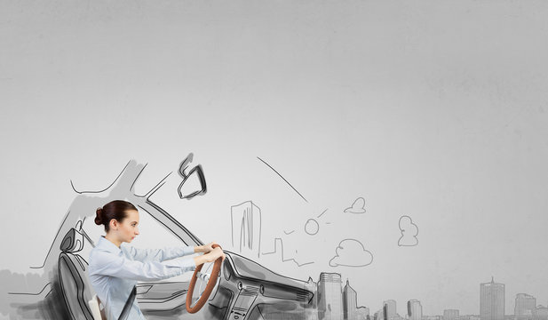 Woman with steering wheel