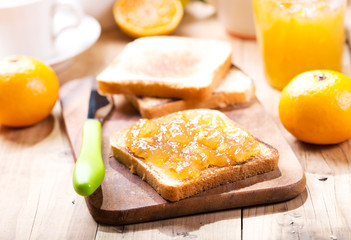 toast with orange mandarin marmalade with fresh fruits