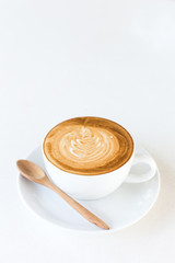 Hot art Latte Coffee in a cup on table
