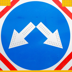 arrows on road sign
