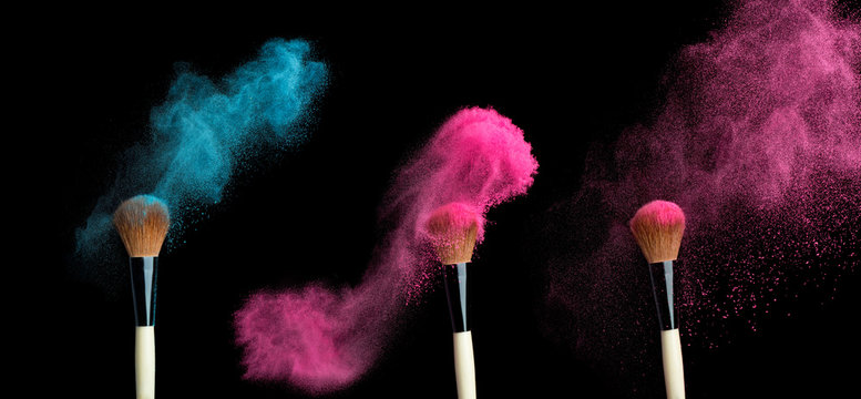 Powderbrush On Black Background With Blue Powder Splash 