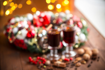 Christmas hot mulled wine with spices on a wooden table. The idea for creating greeting cards