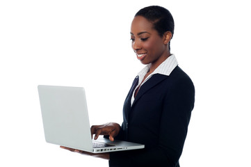 Corporate woman working on laptop