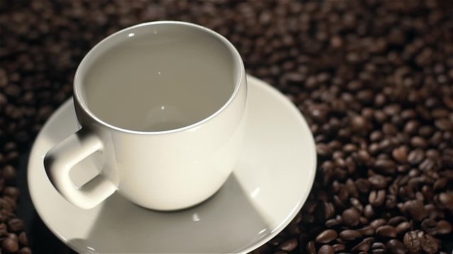 Pouring coffee into cup shooting with high speed camera