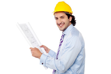 Construction engineer studying the plan