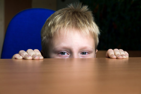 Kid Hiding Under The Table