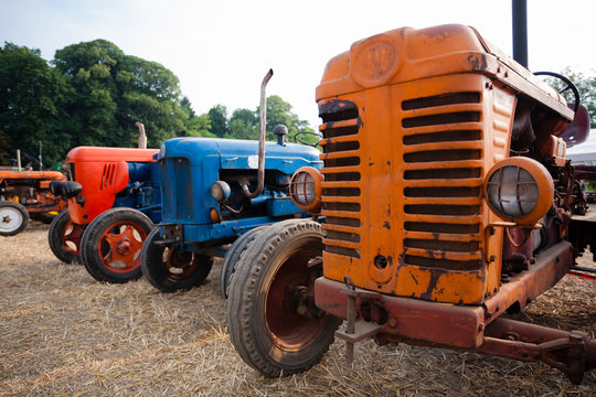 Old tractors in perspective, agricultural vehicle, rural life