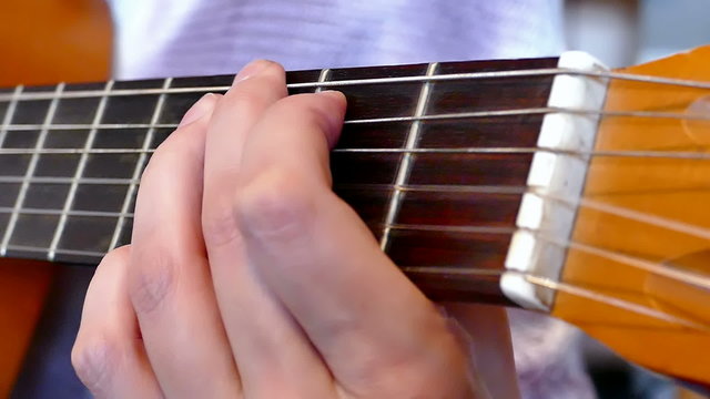 Playing On An Acoustic Guitar, Slow Motion Video clip