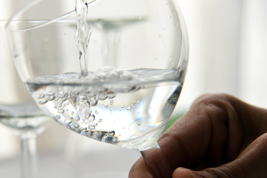 clean and transparent glass filling with water