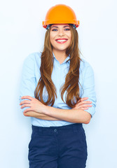 Arhcitect business woman standing against white wall with cross