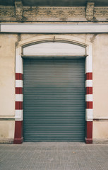 Matalic painted blind of garage. Empty