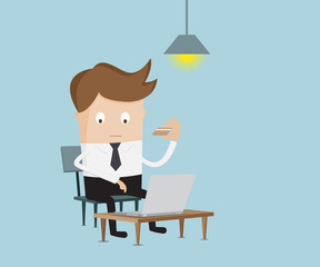businessman using credit card on internet